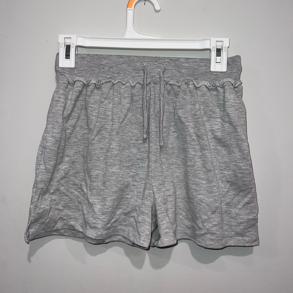 Ruffle Grey shorts. Size L, easily could be size small. Waist is tight.